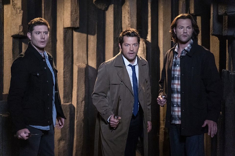 Supernatural -- "Our Father, Who Aren't in Heaven" -- Image Number: SN1508B_0019b.jpg -- Pictured (L-R): Jensen Ackles as Dean, Misha Collins as Castiel and Jared Padalecki as Sam -- Photo: Colin Bentley/The CW -- © 2019 The CW Network, LLC. All Rights Reserved.